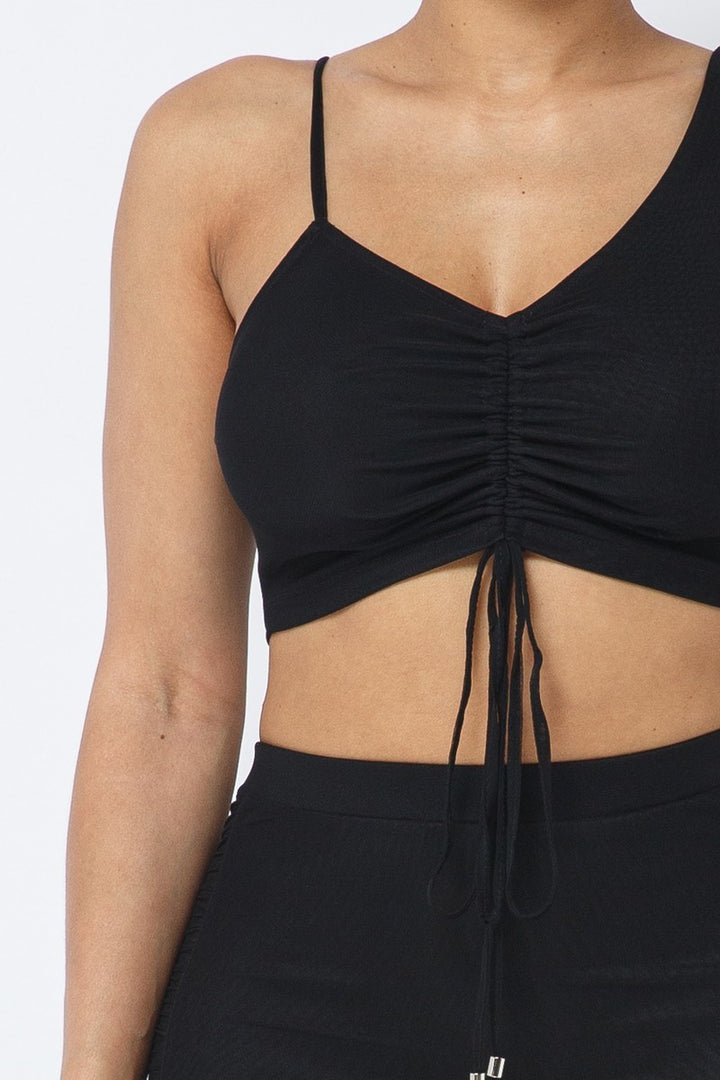 Verstellbares, gerüschtes Crop-Top mit Riemchen aus Netzstoff und passenden durchsichtigen Leggings mit Seiteneinsatz