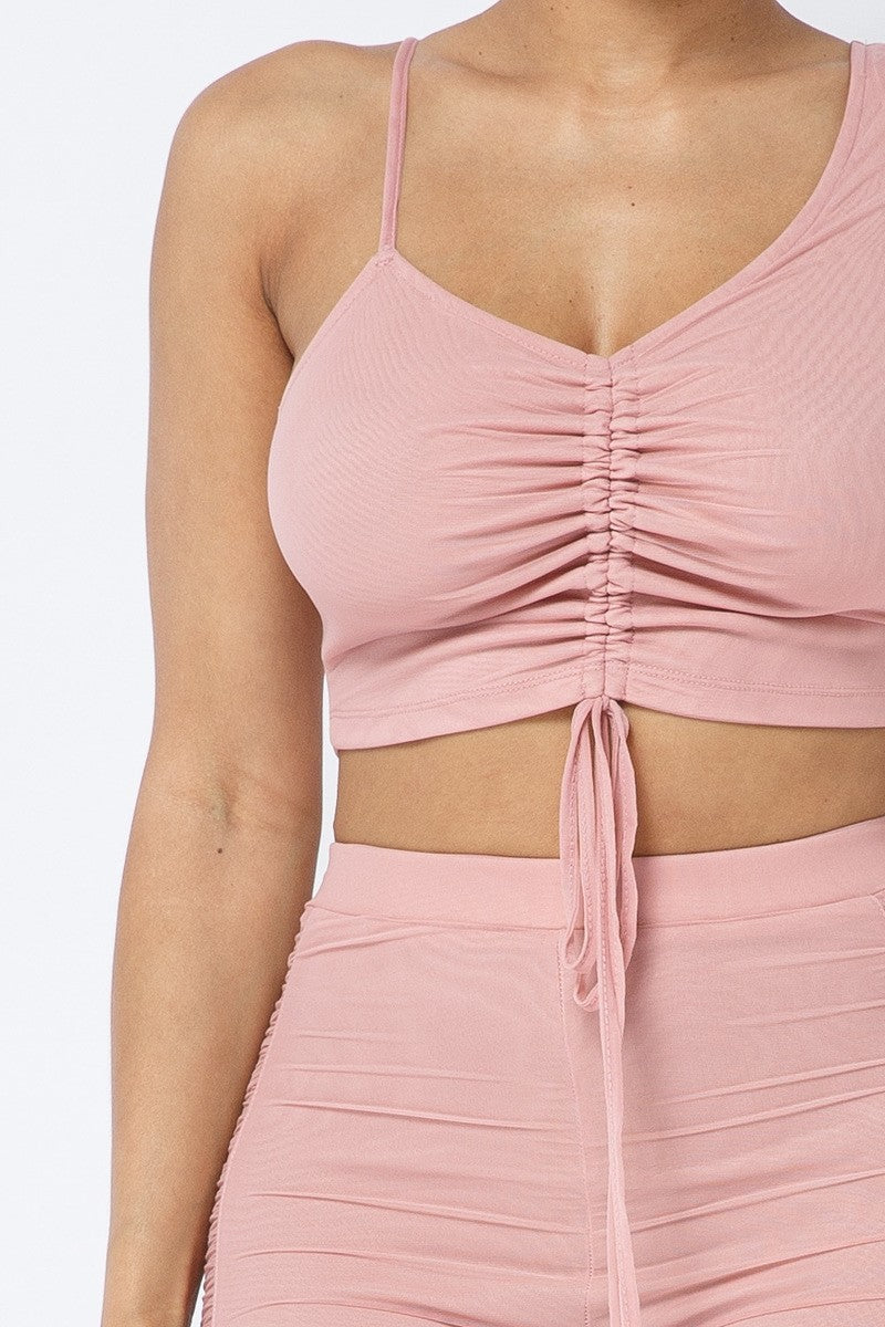 Verstellbares, gerüschtes Crop-Top mit Riemchen aus Netzstoff und passenden durchsichtigen Leggings mit Seiteneinsatz