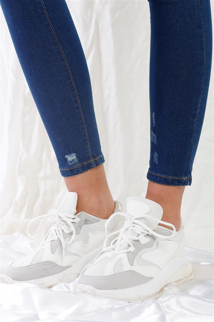 Dunkelblaue Skinny-Jeans mit hoher Taille und Rissen
