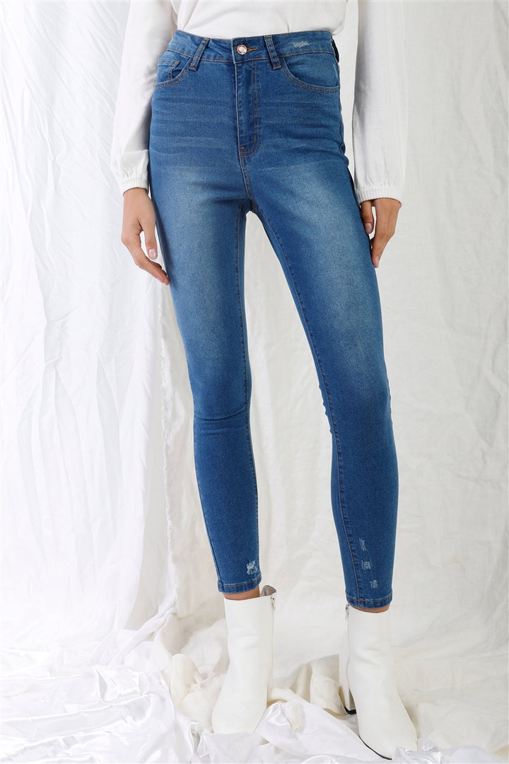 Mittelblaue Skinny-Jeans mit hoher Taille und Rissen
